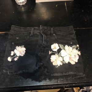 Black floral jean shorts